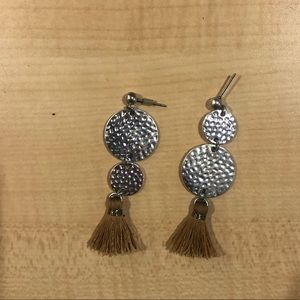 silver earrings with tan tassel